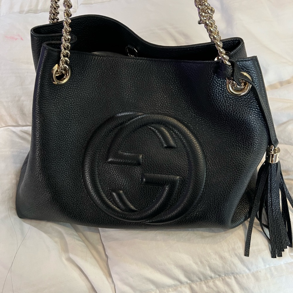 Gucci large black bag pebble leather .